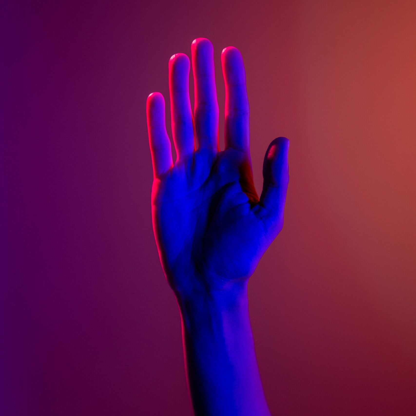 raised hand purple light